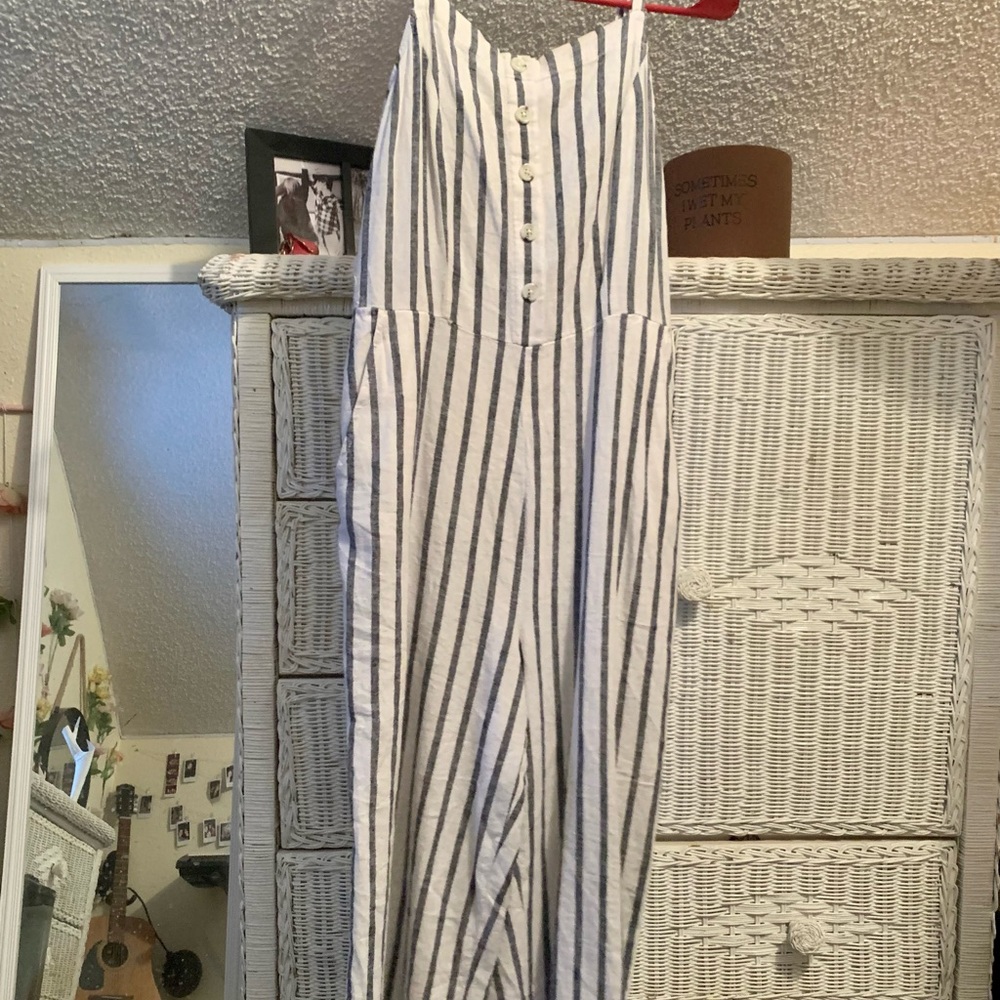 white and navy striped jumpsuit
